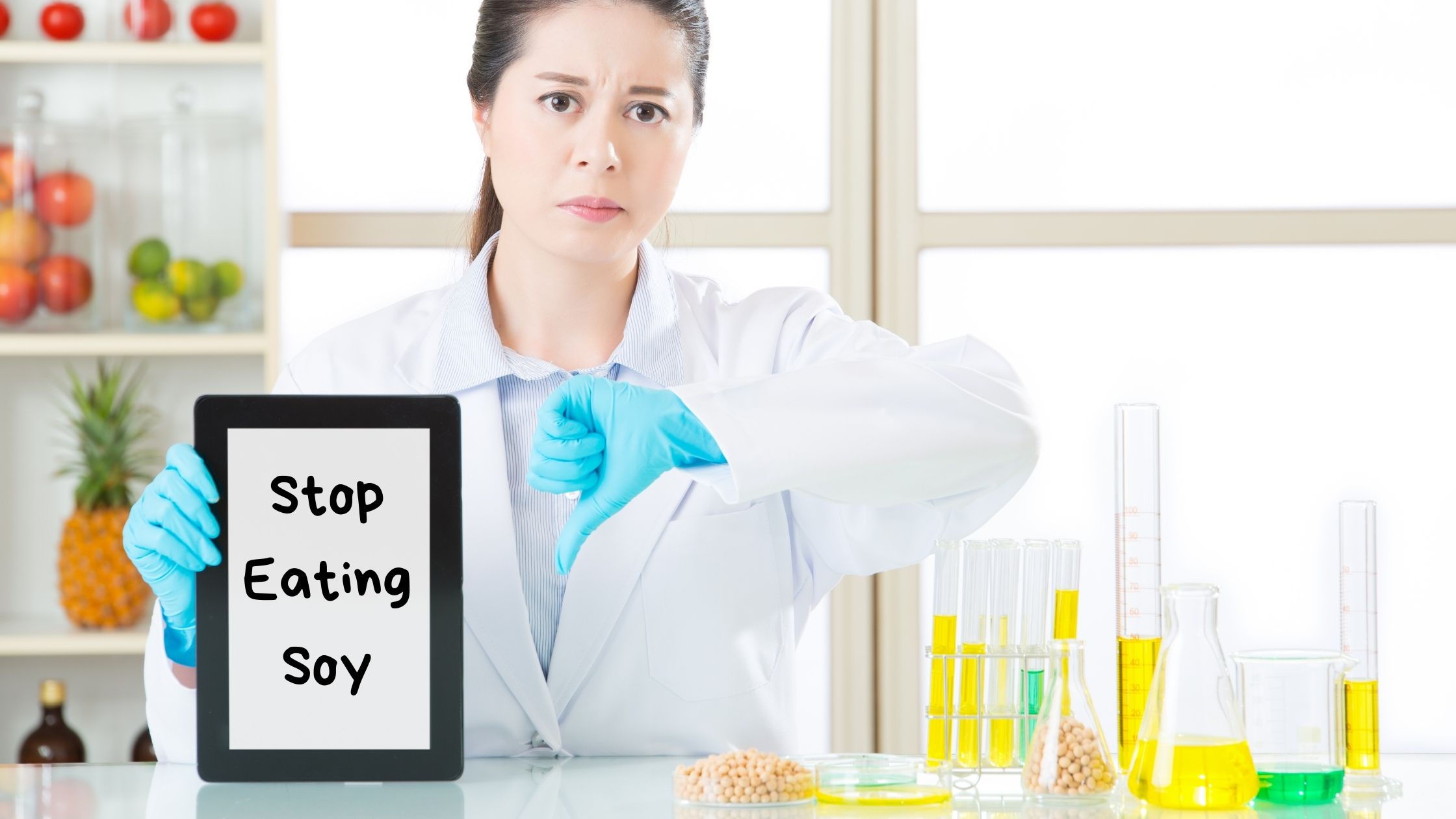 A woman in a lab coat holding a sign that says 'stop eating soy'